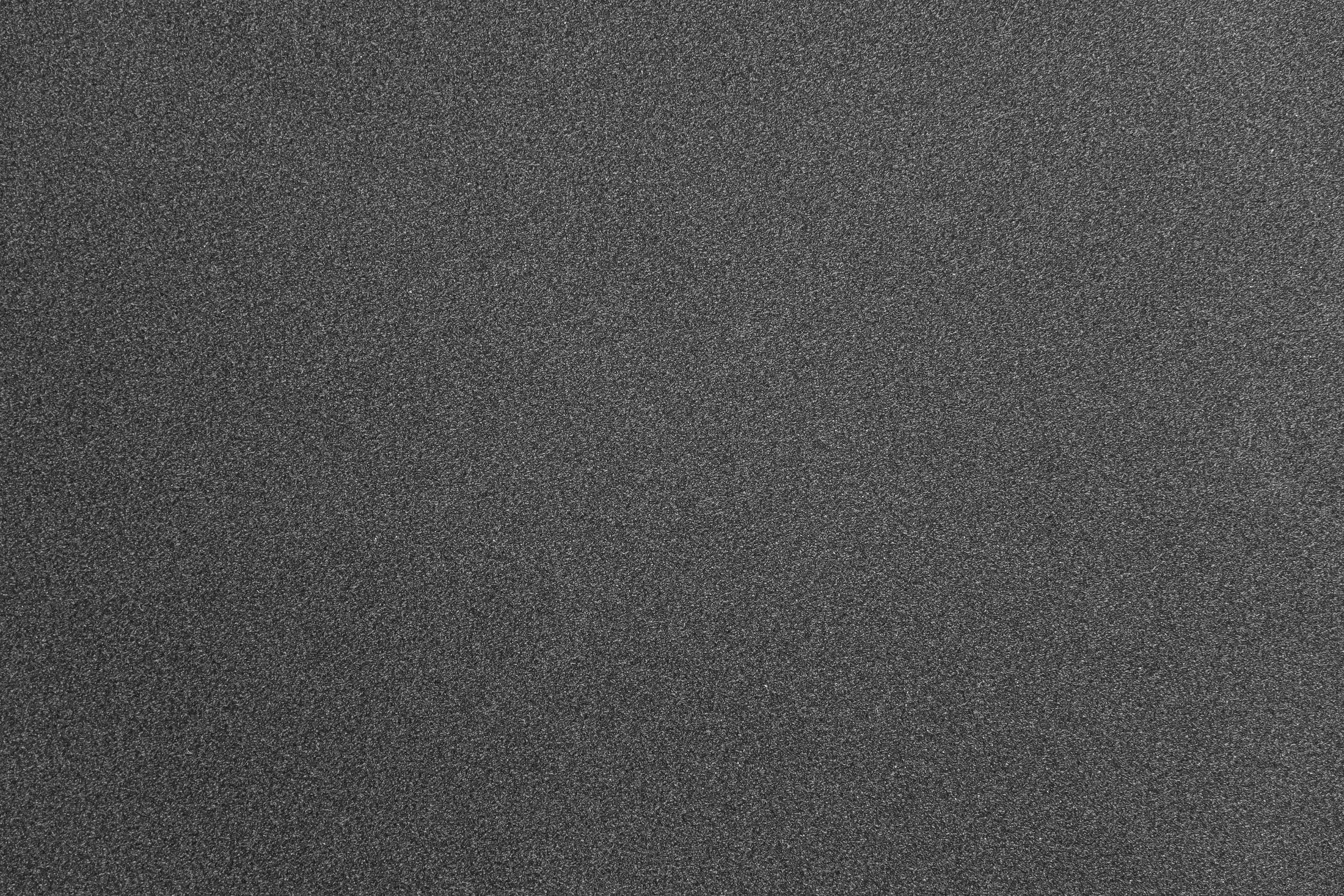 Abstract gray grainy paper texture background